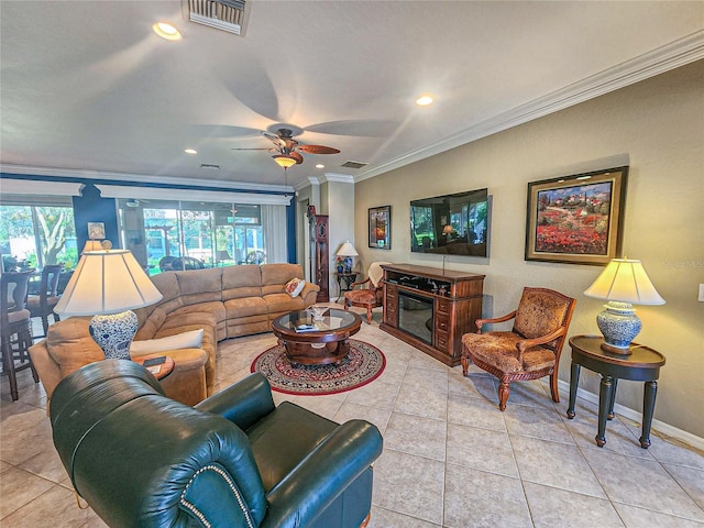 tiled living room with ceiling fan and ornamental molding