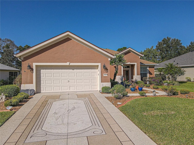 single story home with a garage and a front lawn