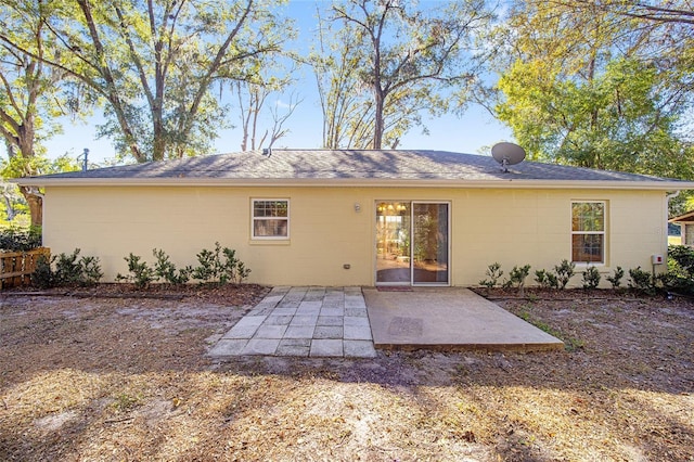 back of house featuring a patio area