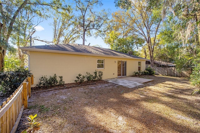 back of house featuring a patio area