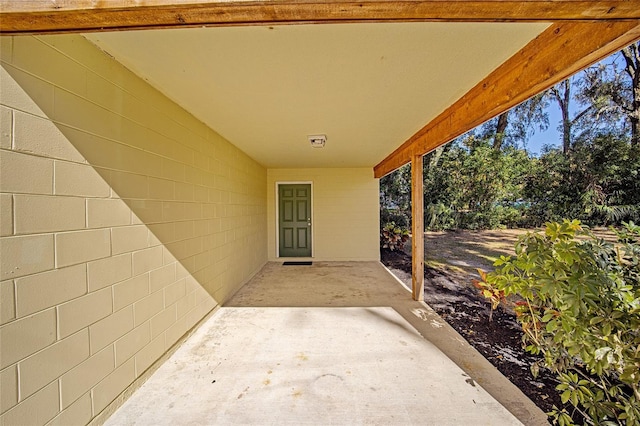 doorway to property featuring a patio