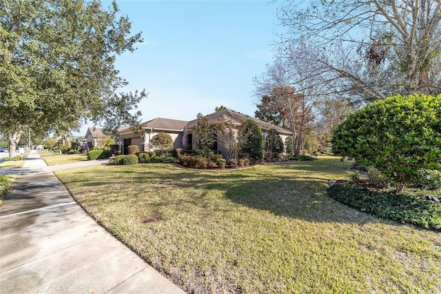 view of side of home featuring a yard