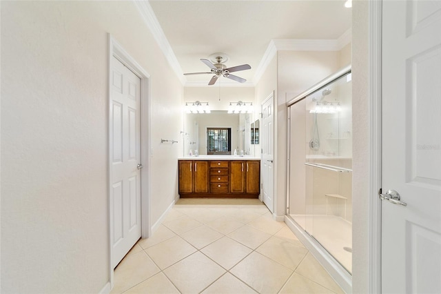 bathroom featuring tile patterned floors, an enclosed shower, ornamental molding, vanity, and ceiling fan