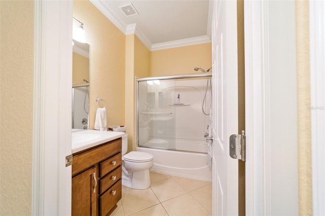 full bathroom featuring vanity, combined bath / shower with glass door, tile patterned flooring, toilet, and ornamental molding