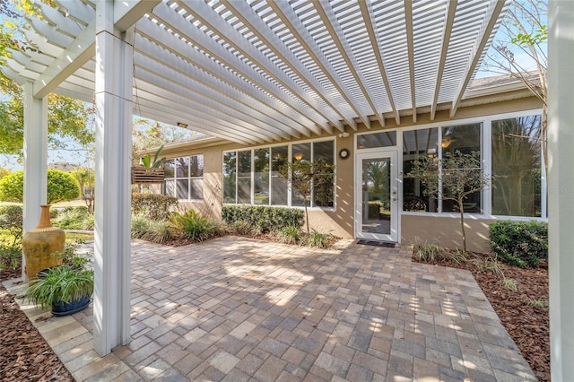 view of patio featuring a pergola