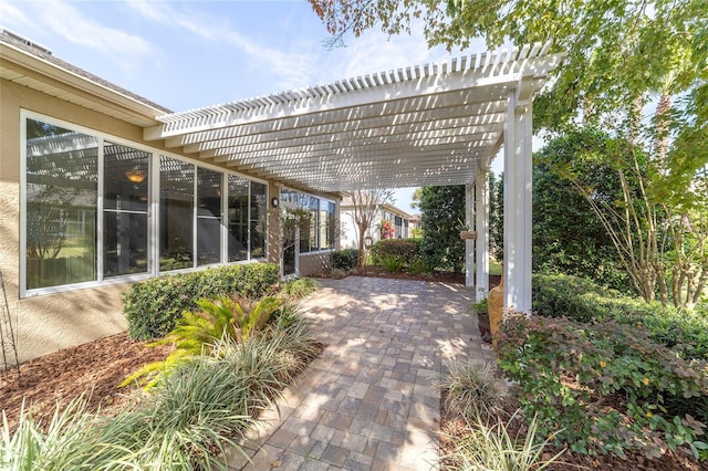 view of patio featuring a pergola