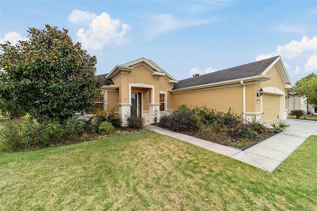 view of front facade featuring a front yard and a garage