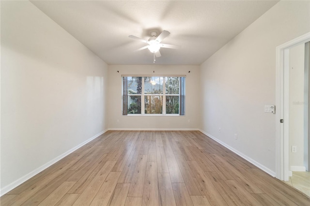 spare room with ceiling fan and light hardwood / wood-style floors