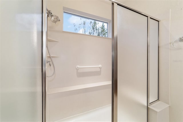 bathroom with an enclosed shower