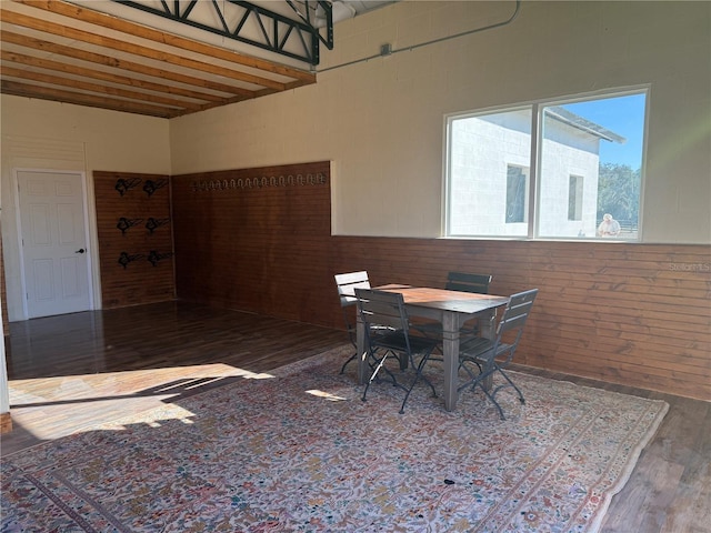 dining area with dark hardwood / wood-style flooring