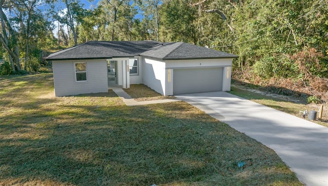 ranch-style home with a front yard and a garage