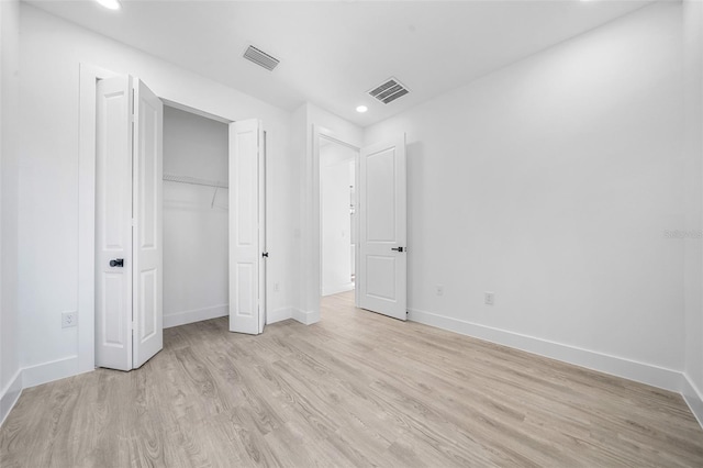 unfurnished bedroom featuring light hardwood / wood-style flooring