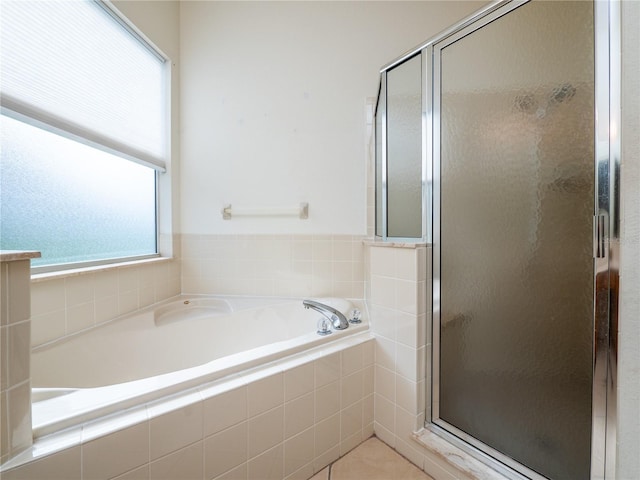 bathroom featuring plus walk in shower