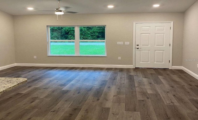 interior space featuring dark hardwood / wood-style floors and ceiling fan