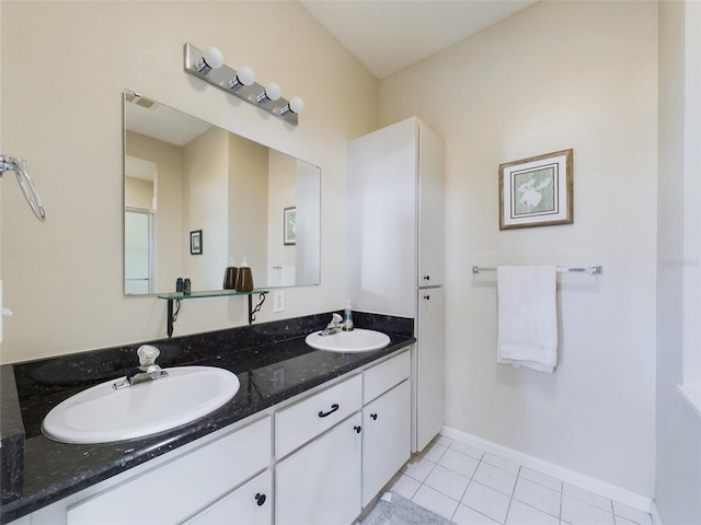 bathroom featuring tile patterned floors and vanity