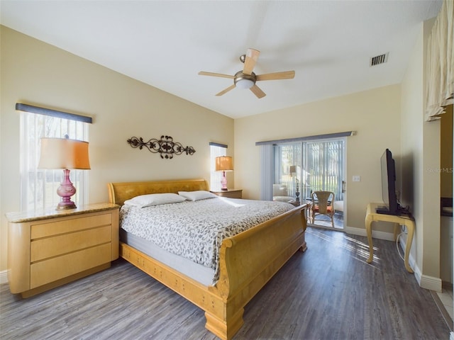 bedroom with ceiling fan and wood-type flooring