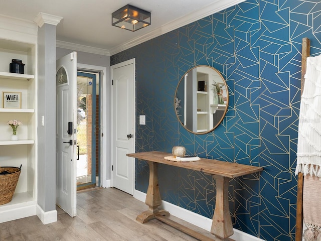 bathroom with ornamental molding, wood-type flooring, and built in features