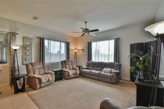 living room with ceiling fan and light carpet