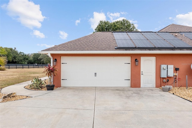 garage with solar panels