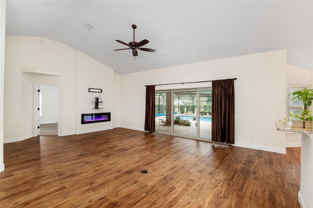 unfurnished living room with lofted ceiling, ceiling fan, and dark wood-type flooring