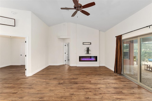 unfurnished living room featuring ceiling fan, dark hardwood / wood-style floors, and vaulted ceiling