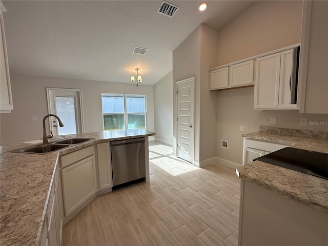 kitchen featuring white cabinetry, dishwasher, sink, a textured ceiling, and decorative light fixtures