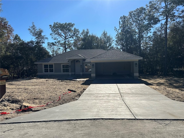 single story home with a garage