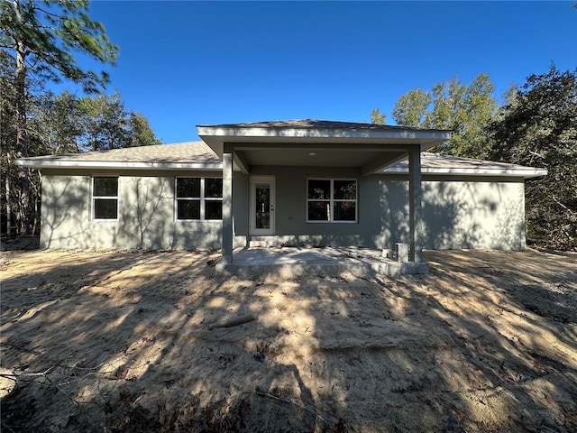 rear view of house with a patio area