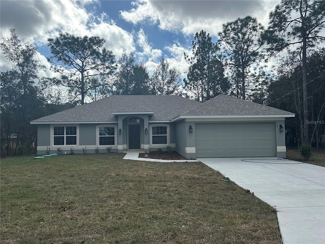 ranch-style home with a garage and a front yard