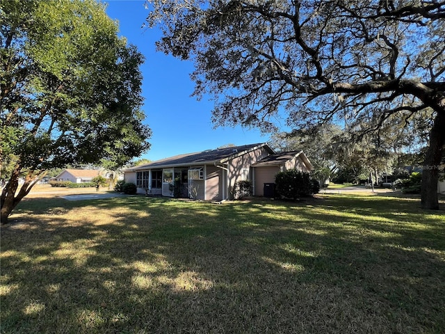 exterior space with a lawn