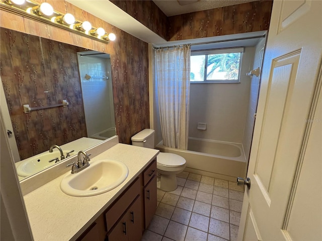 full bathroom featuring tile patterned flooring, toilet, wooden walls, shower / tub combo with curtain, and vanity