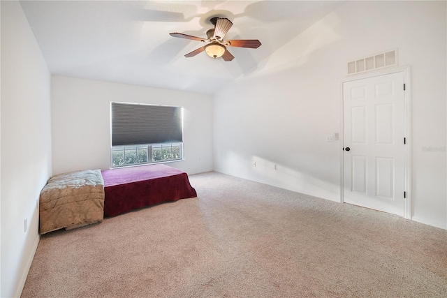 bedroom featuring ceiling fan and carpet floors