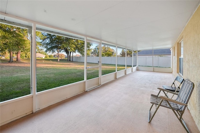 unfurnished sunroom featuring a healthy amount of sunlight