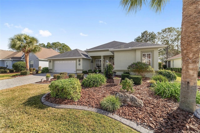 ranch-style house with a front lawn and a garage