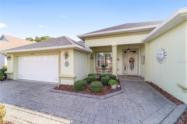 view of front of home with a garage