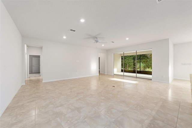 unfurnished room featuring ceiling fan