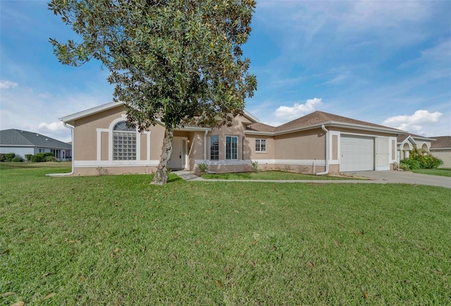 single story home featuring a garage and a front lawn