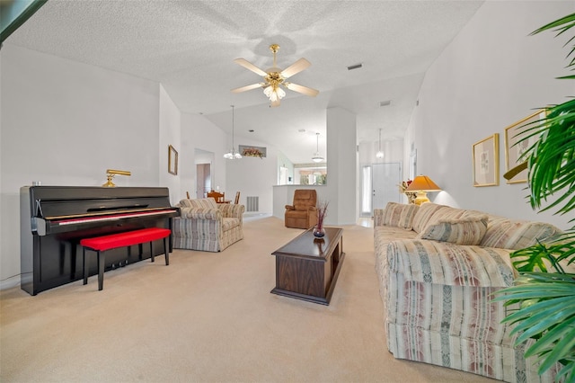 carpeted living room with a textured ceiling, ceiling fan with notable chandelier, and lofted ceiling