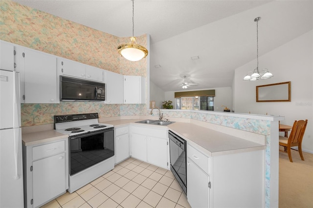 kitchen featuring white cabinetry, sink, pendant lighting, lofted ceiling, and black appliances