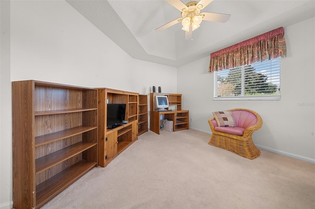 living area with ceiling fan and light carpet