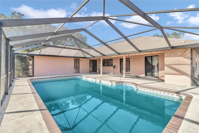 view of pool featuring a lanai and a patio