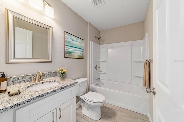 full bathroom with bathing tub / shower combination, tile patterned flooring, vanity, and toilet