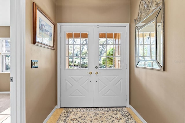 doorway to outside featuring french doors