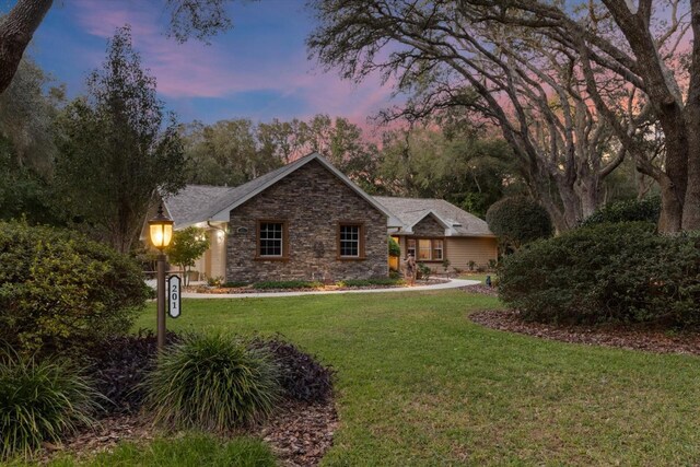 view of front of home featuring a yard