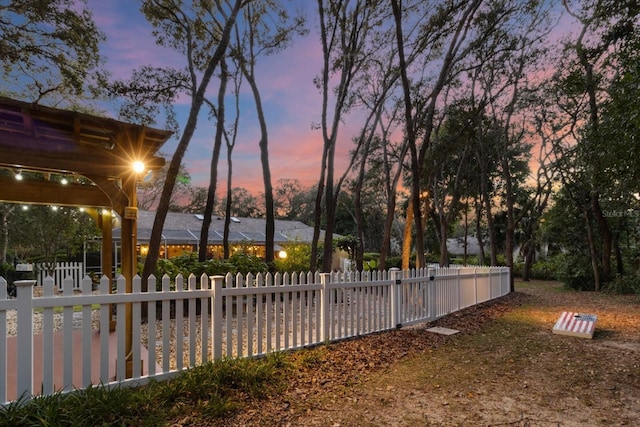 view of yard at dusk