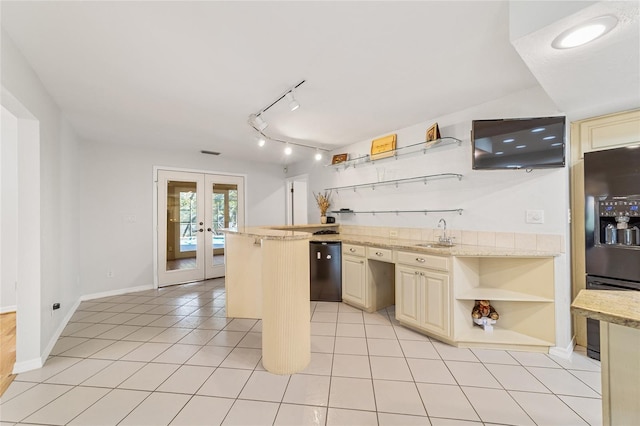 kitchen with sink, french doors, cream cabinetry, light tile patterned flooring, and black appliances