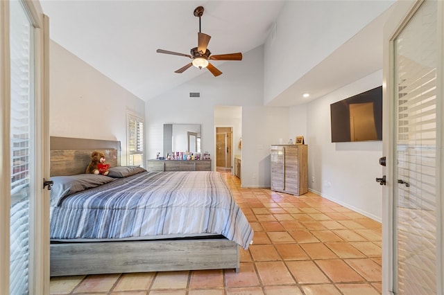 bedroom featuring ceiling fan, light tile patterned floors, and high vaulted ceiling