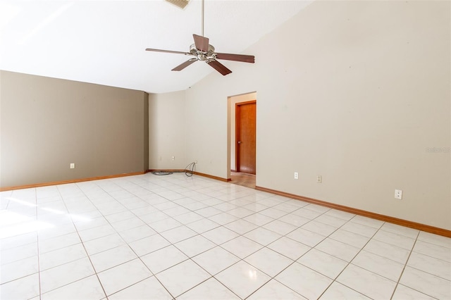 spare room featuring ceiling fan, light tile patterned floors, and high vaulted ceiling