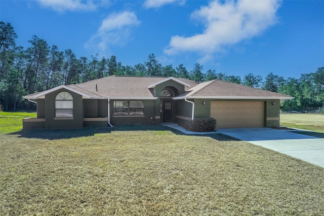 ranch-style home featuring a garage and a front yard