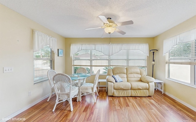 interior space with ceiling fan and a healthy amount of sunlight